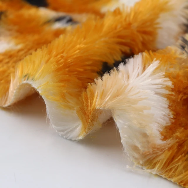 ผ้า Poly Boa (ลายเสือดำ-ส้ม)