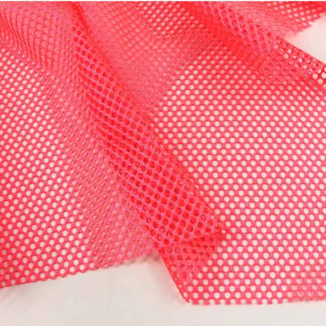 ผ้าตาข่ายสะท้อนแสง (ชมพูนีออน)