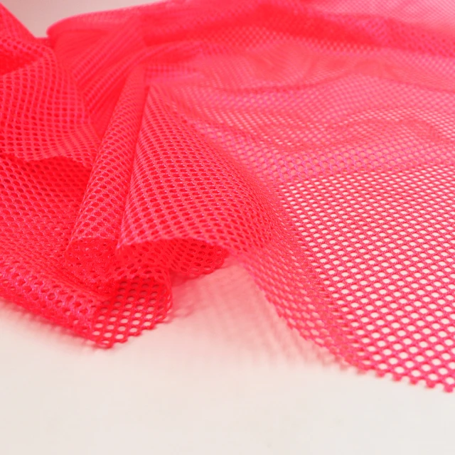 ผ้าตาข่ายสะท้อนแสง (ชมพูนีออน)