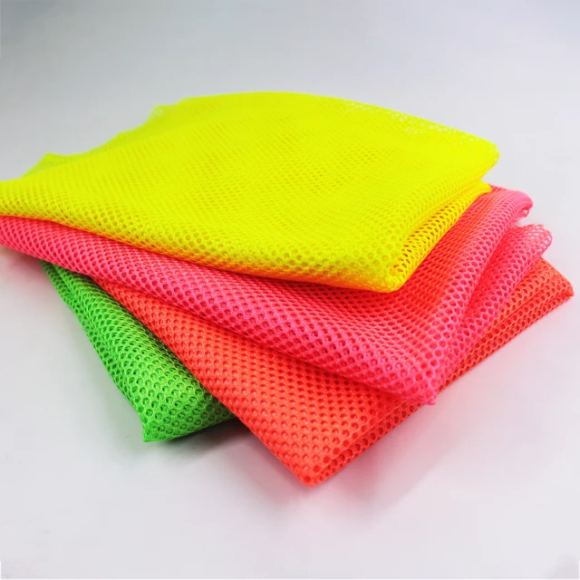 ผ้าตาข่ายสะท้อนแสง (ส้มนีออน)