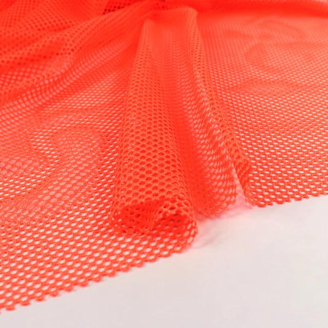ผ้าตาข่ายสะท้อนแสง (ส้มนีออน)