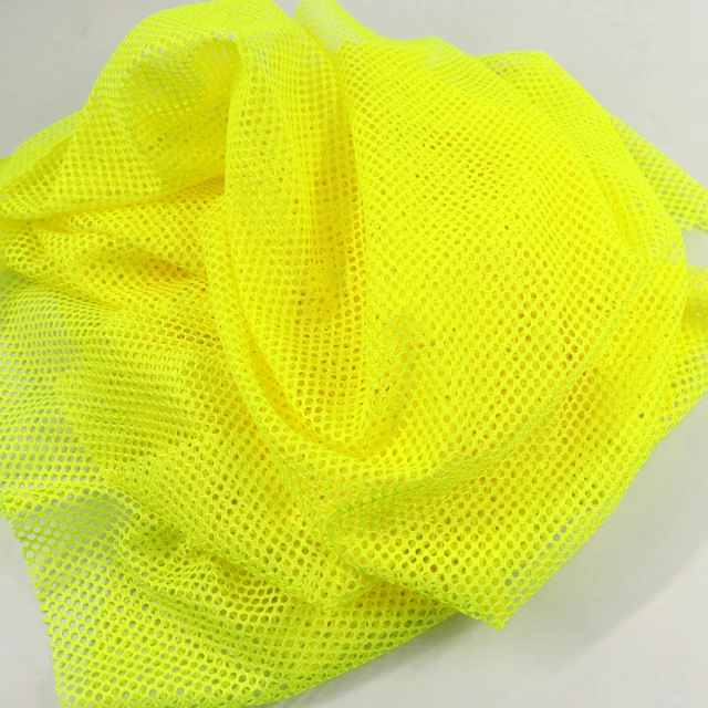 ผ้าตาข่ายสะท้อนแสง (เหลืองนีออน)