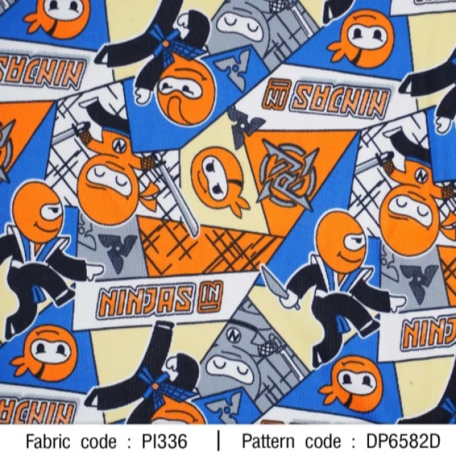 ผ้าพิมพ์ NINJAS(ส้มน้ำเงิน)