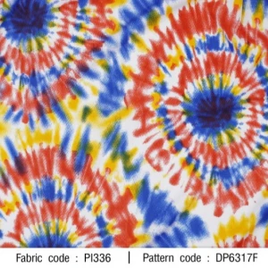 ผ้าพิมพ์มัดย้อมเรกเก้(น้ำเงินแดง) - primary