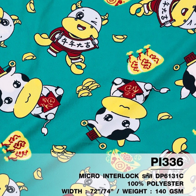 ผ้าพิมพ์วัวเฮงเฮง(เขียว)