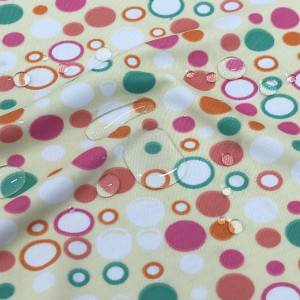 ผ้าพิมพ์สะท้อนน้ำ/สีลูกกวาด(เหลือง) - primary