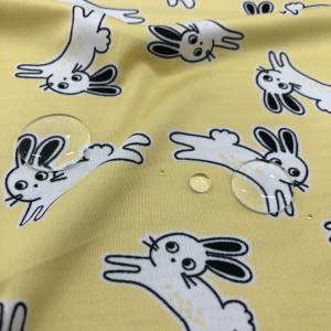 ผ้าพิมพ์สะท้อนน้ำ/กระต่าย(เหลืองไข่)