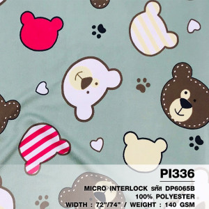 ผ้าพิมพ์หน้าหมีน้อย(เขียว) - primary