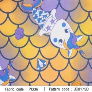 ผ้าพิมพ์เกล็ดนางเงือกยูนิคอร์น(ม่วงเหลือง) - primary