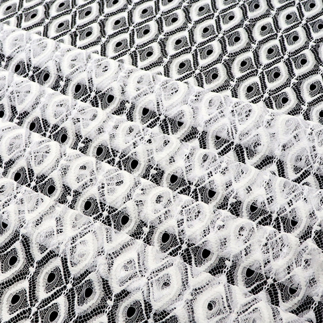 ผ้าลูกไม้(ตาข่ายลายนกยูง)