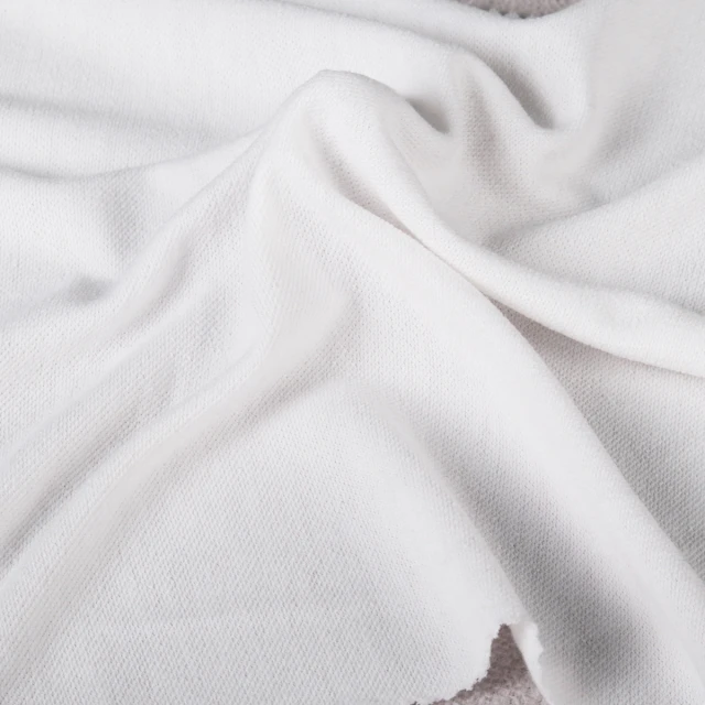 ผ้าเกล็ดปลา180gsm.(ขาว)